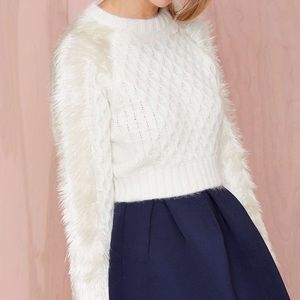 Cropped cable knit sweater